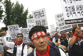 U.S.-S. Korea unions link up vs. free trade pact
