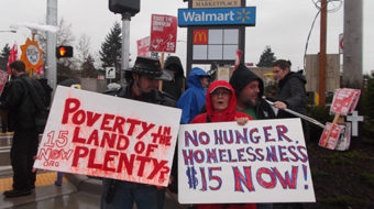 Undaunted by rain, Tacoma marchers demand “$15 now!”