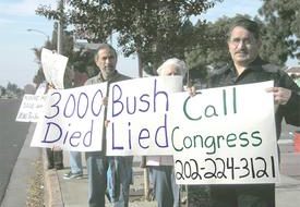 Vigils mourn 3,000 dead, call for end to Iraq war