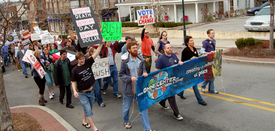 From statehouse to village green, Americans stand for peace