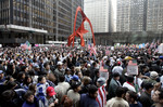 “Were here to stay!” Nations largest immigrant rights rally rocks Windy City