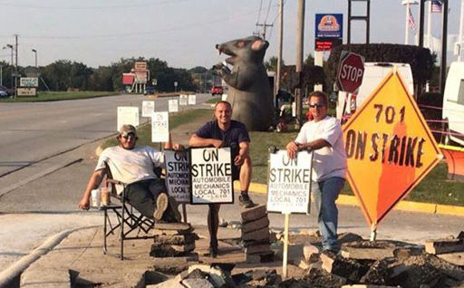 Auto mechanics won’t be bulldozed off the picket line