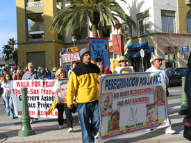 Peace, peace, peace! Children greet antiwar pilgrimage