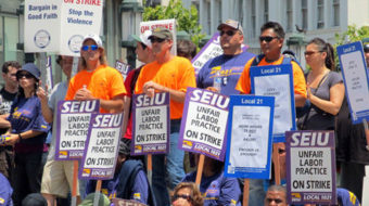 Striking rapid transit, city workers rally in Oakland, Calif.