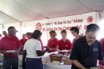 Michigan nurses protest GOP cuts with soup kitchen at State Capitol