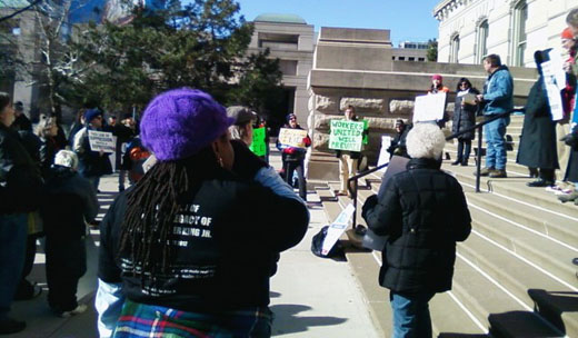 Indy Occupy movement joins with labor unions in protest at Super Bowl Village