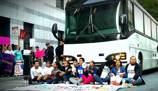 Undocumented activists block another deportation bus