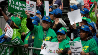 NYC public workers battle Bloomberg, with video