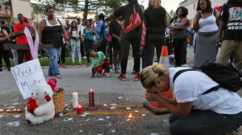 Ferguson, Missouri residents grieve and protest in wake of killing by police