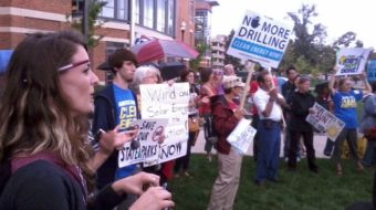 Activists rally outside Ohio Governor Kasich’s energy summit