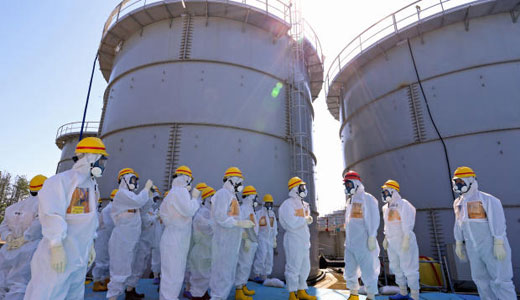 Workers hit with radioactive water as Fukushima disaster continues