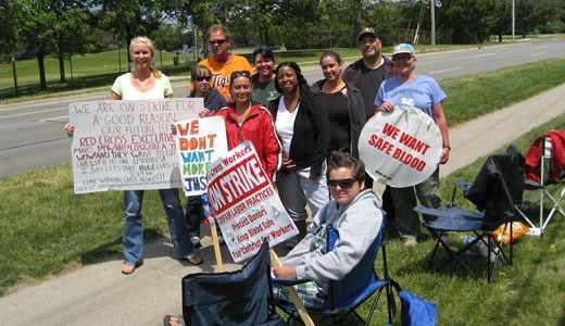 Striking workers assail Red Cross “union-avoidance plan”