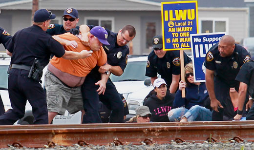 Washington state unions see arrests on docks as part of pattern