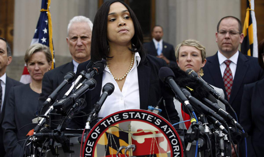Baltimore prosecutor brings murder, manslaughter charges against six police