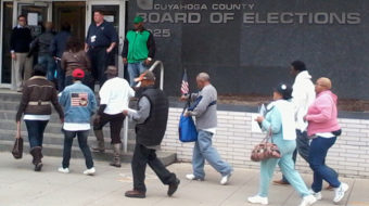 Defying obstruction, voting begins in Ohio