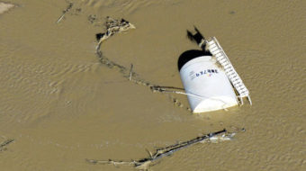 Oil-tarnished land left in wake of Colorado flood
