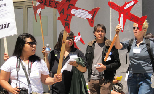 Airport workers picket for right to organize