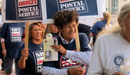Workers demonstrate to save the U.S. mail