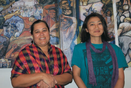 Dr. Lisa Linda Natividad (left) and fellow activist Kosuzu Abe (right) at the Peter Symon Building in Sydney. | Guardian