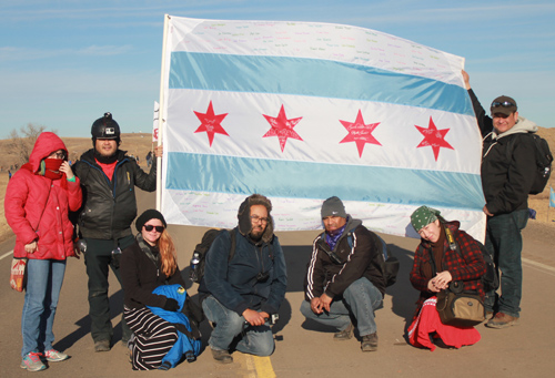 Chicago-based water protectors gather to protest the pipeline site in North Dakota. Michelle Zacarias | PW