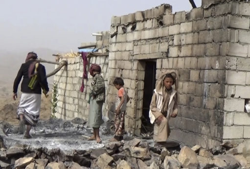 The U.S. continues to back its ally Saudi Arabia in a harsh military intervention in Yemen, widely seen as a proxy war against Iran. Here, residents in the small village of Yakla in central Yemen inspect the damage after a botched U.S. raid ordered by President Trump on Jan. 29, 2017. | AP