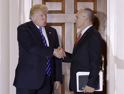 President Donald Trump and Andy Puzder leaving Trump National Golf Club. | Carolyn Kaster / AP