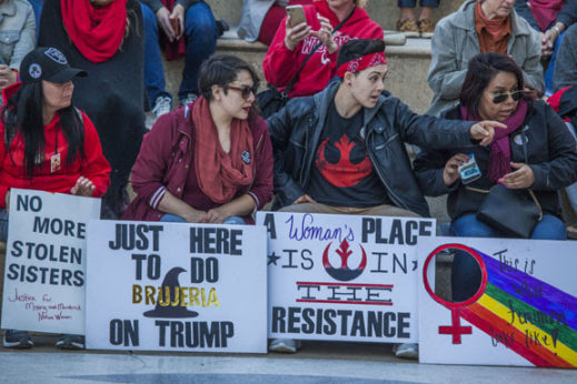 OAKLAND, CA - 8MARCH17 - Women and their men supporters celebrate International Women's Day in front of Oakland City Hall. Women protested the anti-women policies and statements of Donald Trump as U.S. President, as well.Copyright David Bacon