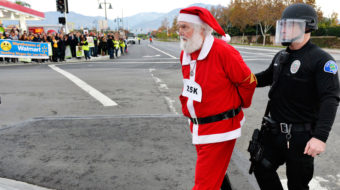 Santa goes on strike, demands Walmart bring back holiday pay
