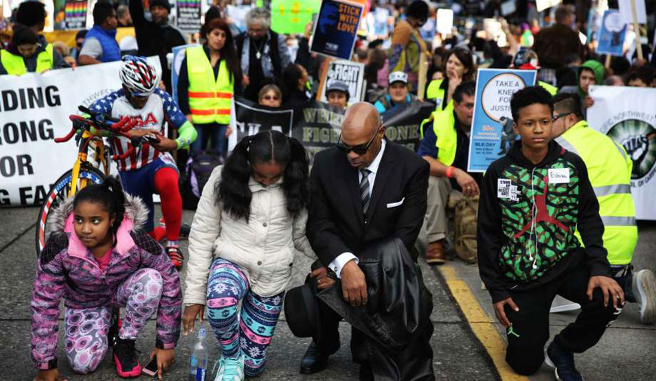 Seattle MLK rally and march: “Take a knee for justice”