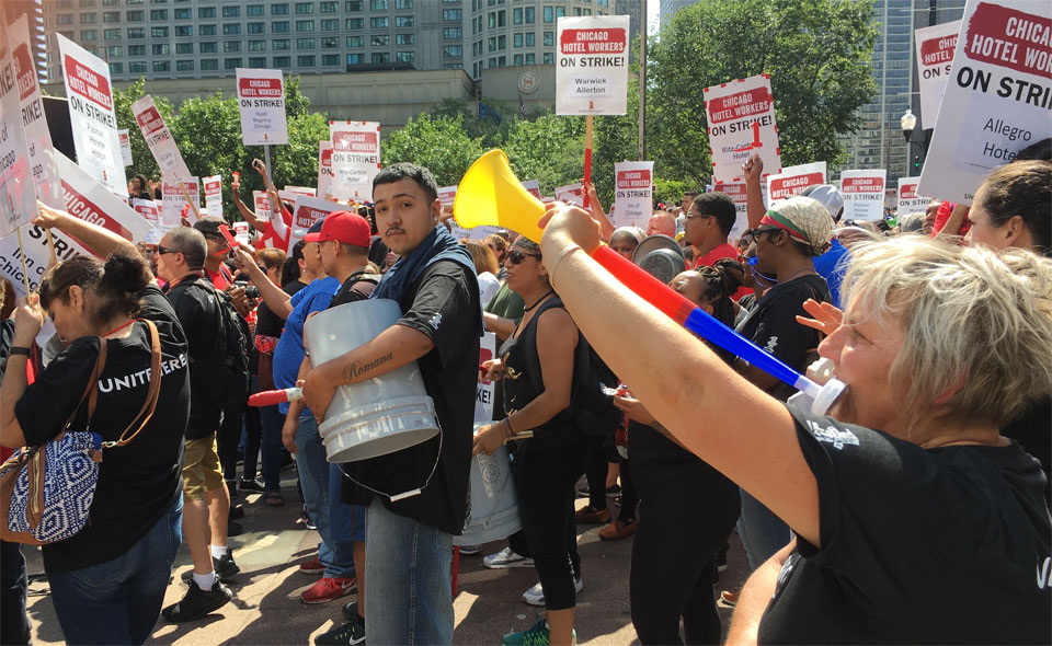 Thousands of striking hotel workers take over Chicago’s Magnificent Mile