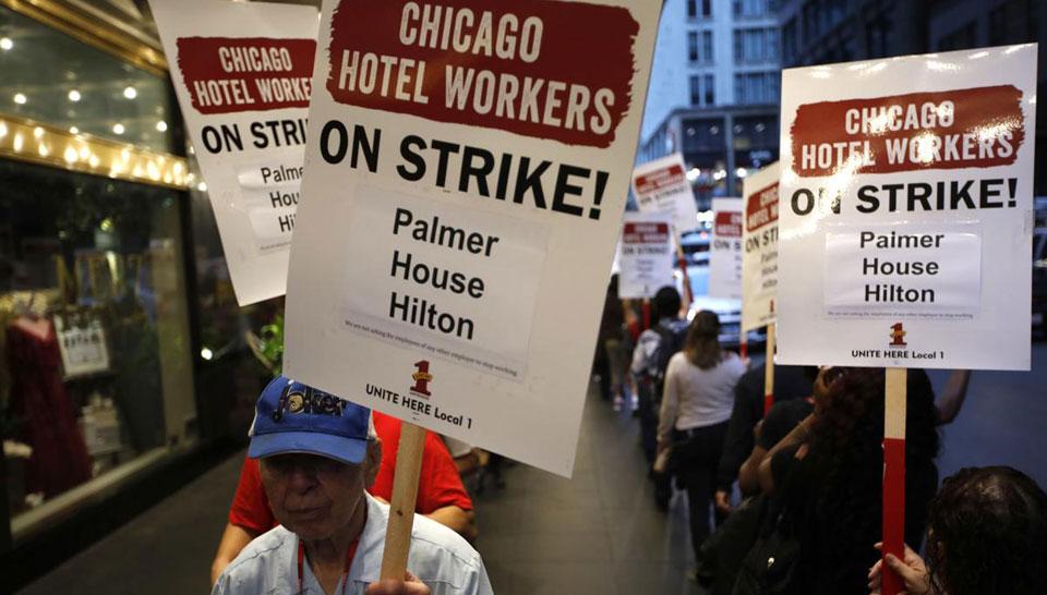 Taking to the streets, Unite Here hotel workers go on strike