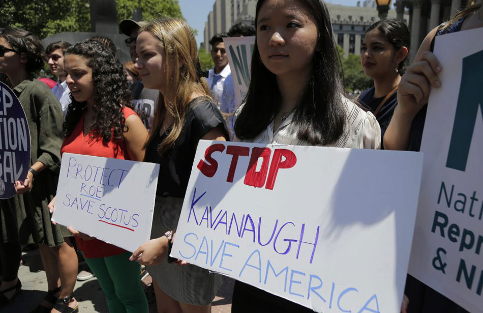 Led by victims, tens of thousands march nationwide against Kavanaugh