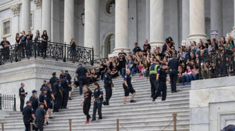 Amid protests and arrests, Senate puts Kavanaugh on Supreme Court