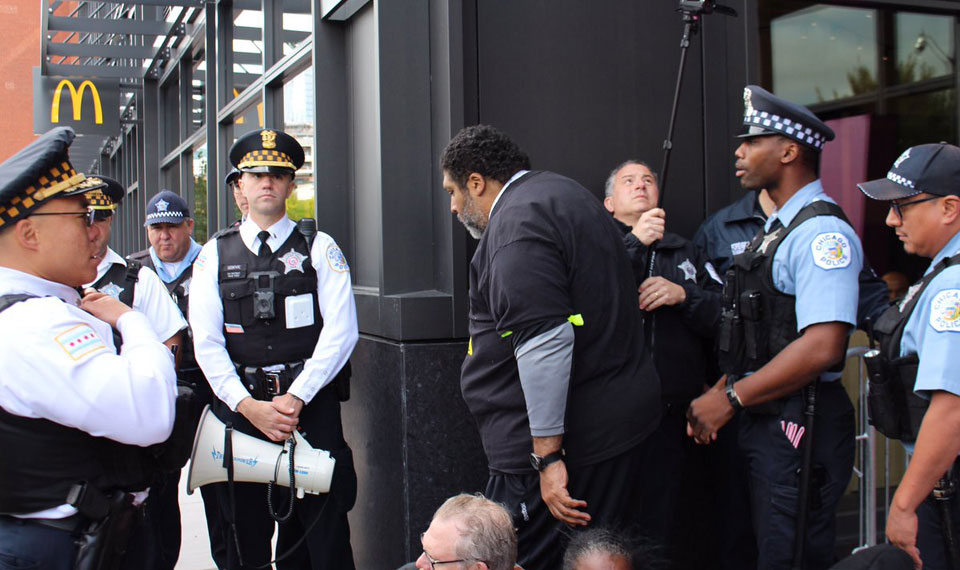 While being arrested at McDonald’s workers demo, Rev. Barber gets ‘genius grant’