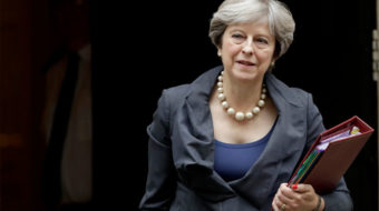 British Prime Minister Theresa May lives to negotiate Brexit another day