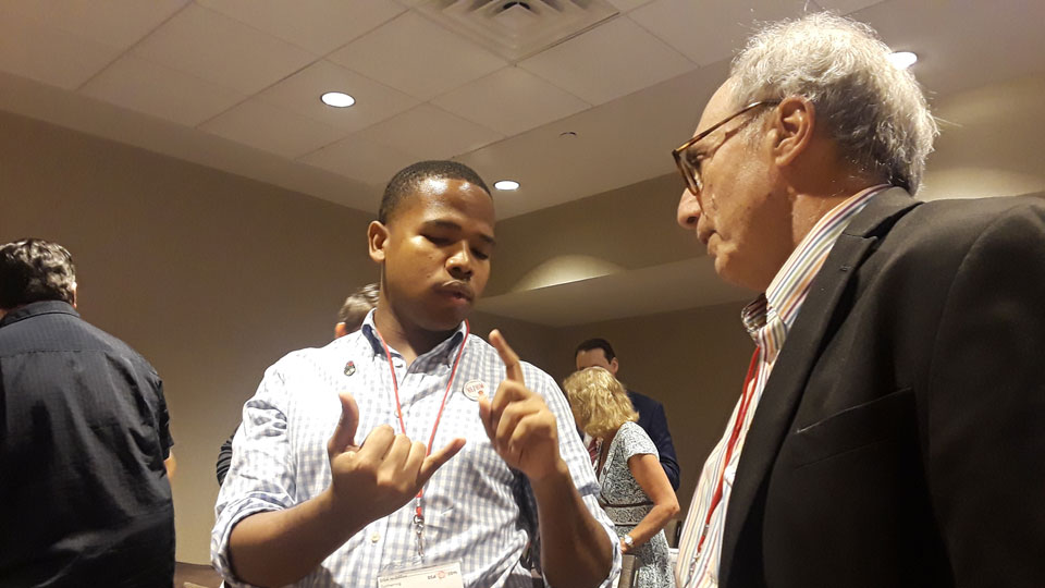 Socialist elected officials speak to the press at DSA convention