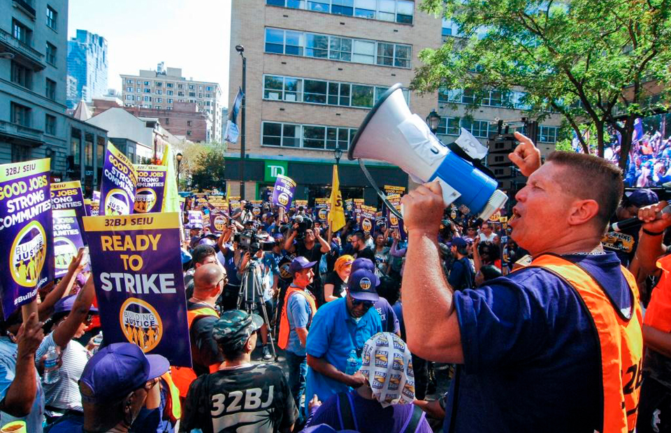 Low pay, lack of respect force janitors to march, maybe strike