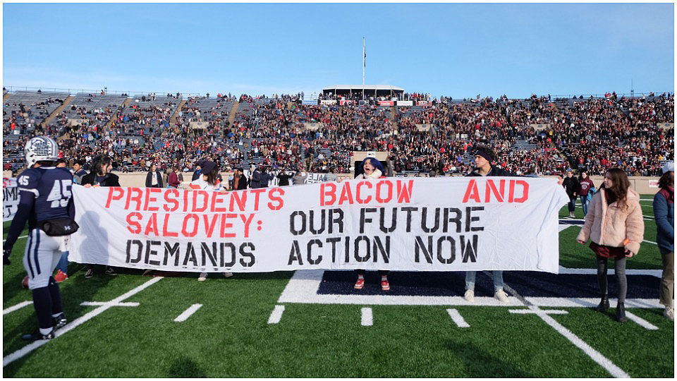 Yale-Harvard football game protesters demand divestment from fossil fuels