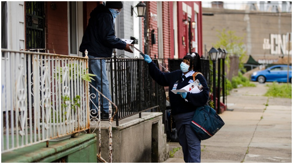 Detroit car caravan supports workers and fights U.S. Postal Service privatization