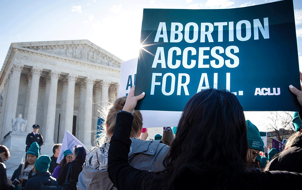 Supreme Court tosses Louisiana anti-abortion law, drawing cheers