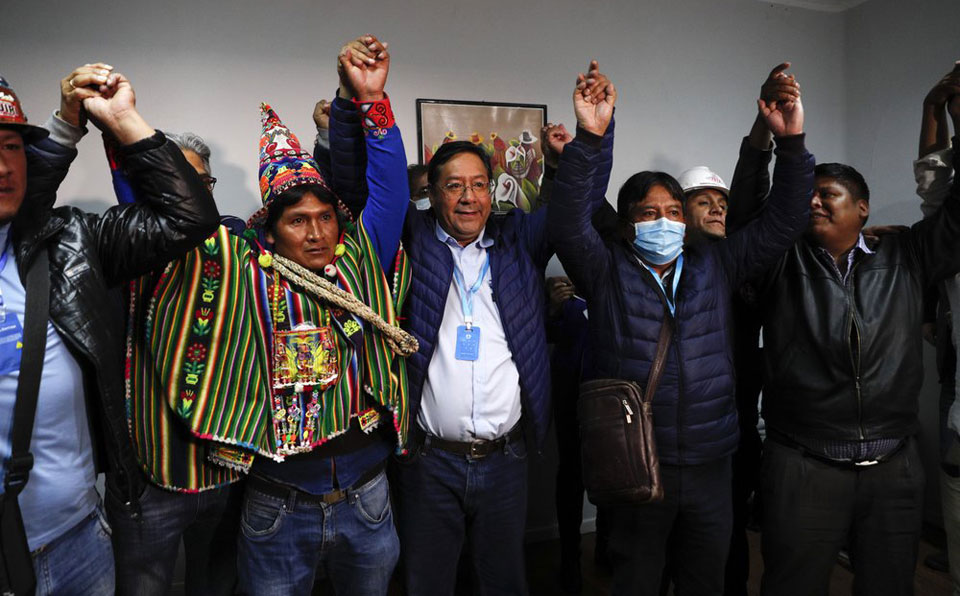Socialists win big in Bolivia; Morales expected to return from exile