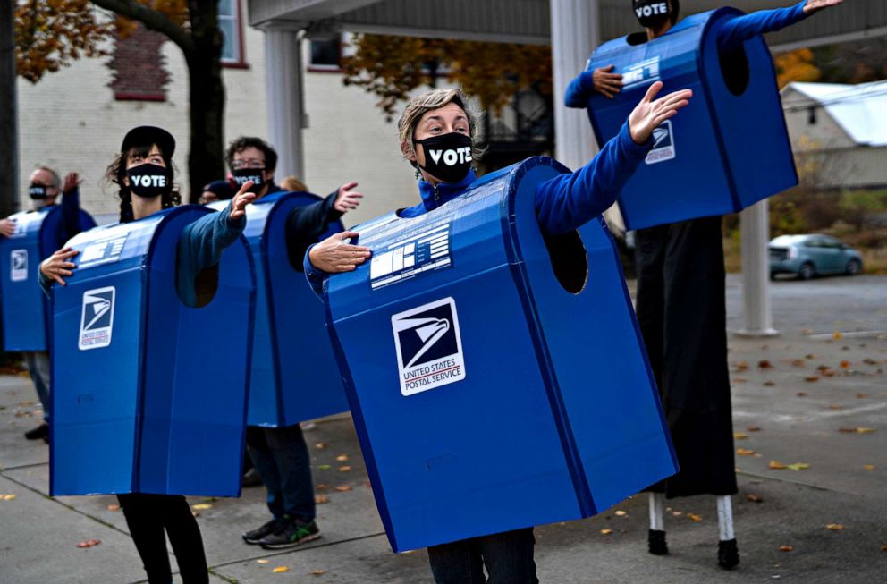 Put postal workers on the list of election heroes