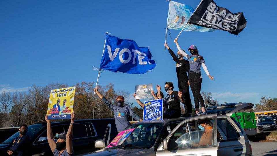 Georgia voters in the millions rise up in historic election today