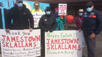 Native Americans help residents of a Washington State county get COVID vaccinations