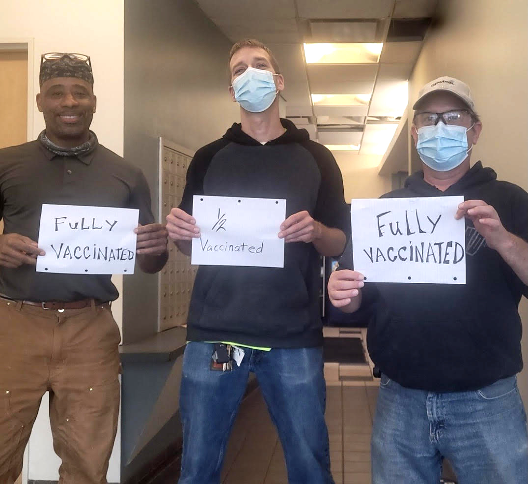 Construction unions battle vaccine reluctance among members People's