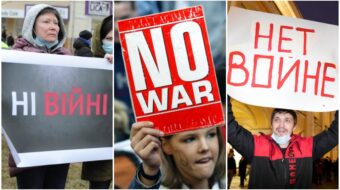 Anti-war protest signs in Ukrainian English and Russian