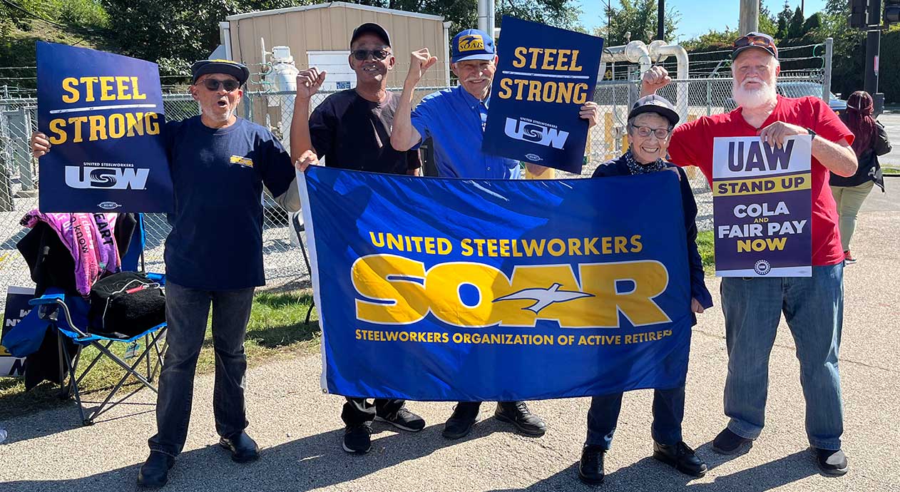Record national strike wave swells as 300,000 hit the picket lines