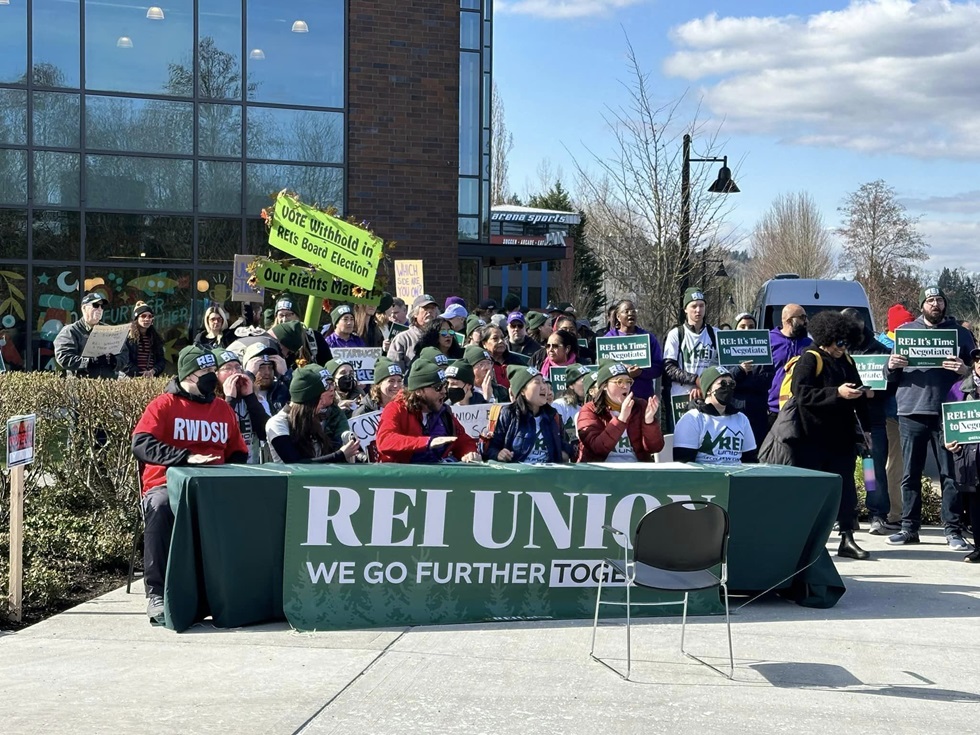 REI workers march on co-op headquarters, bringing contract goals