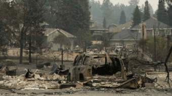 Spokane below my wings, lost in smoke, all ashes